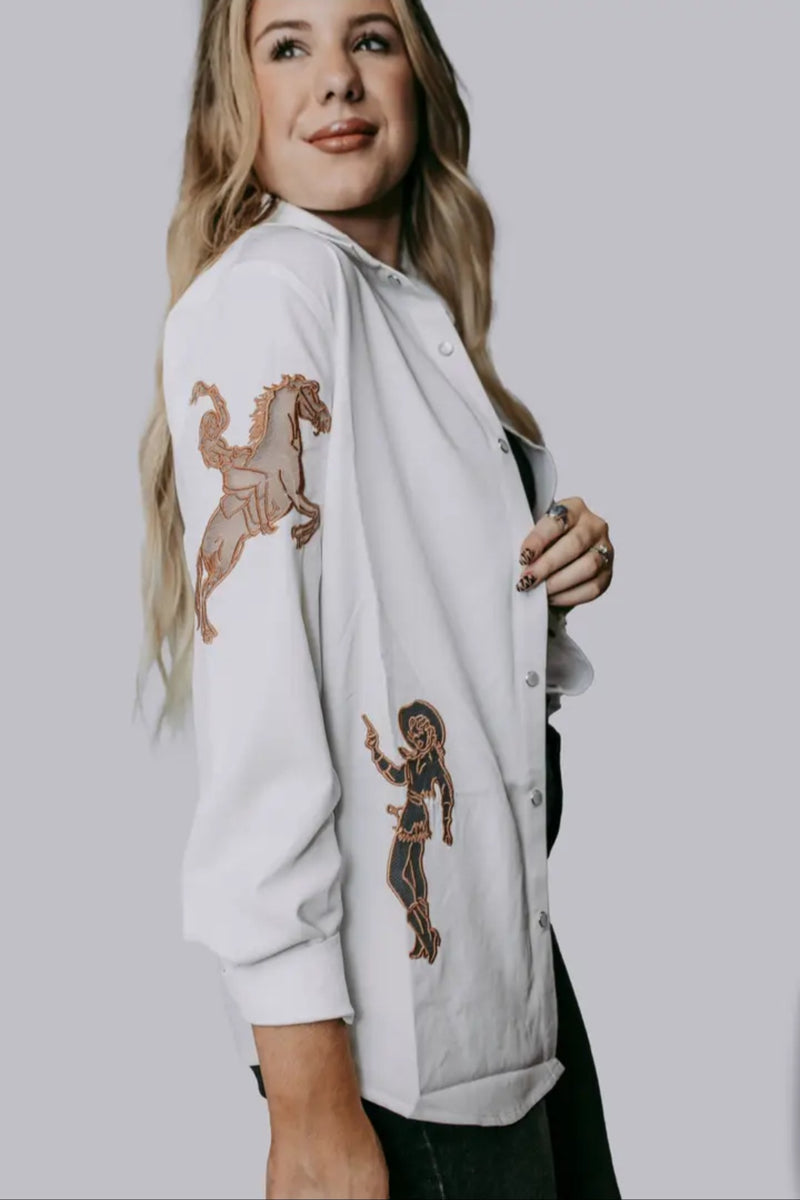 Western cut out embroidery pearl snap button down shirt.
