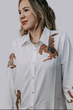 Western cut out embroidery pearl snap button down shirt.